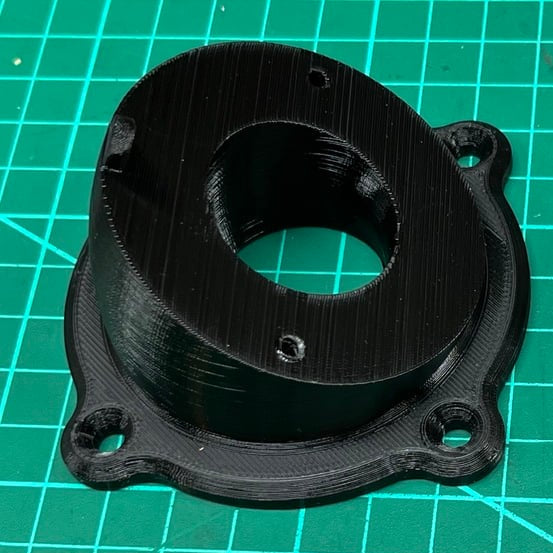 Mechanical components on a green grid background