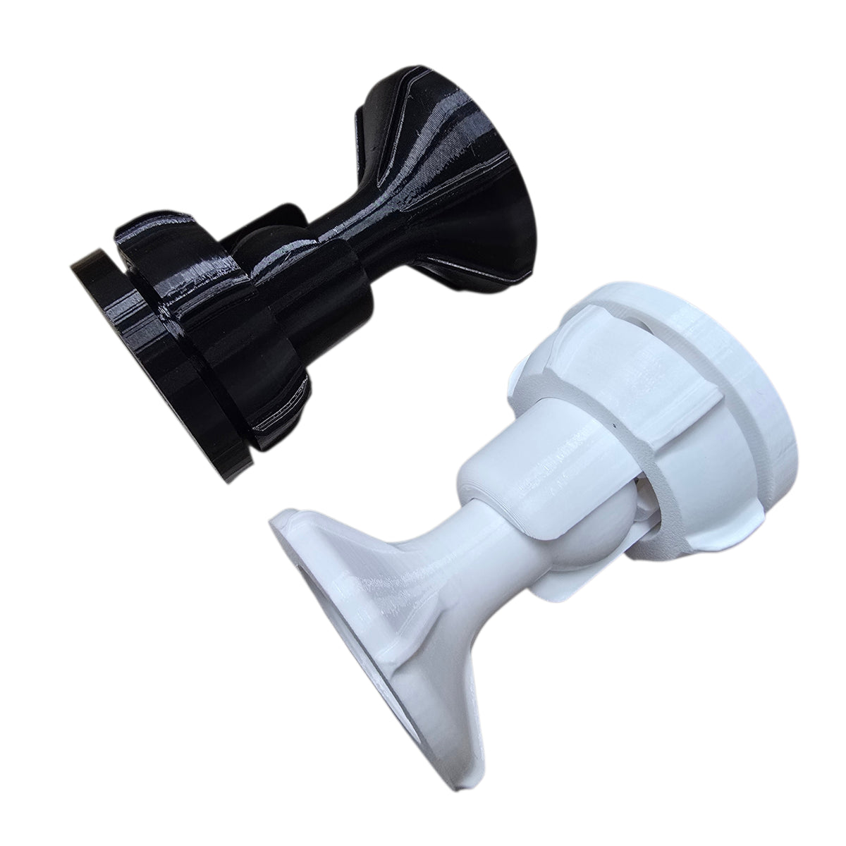 Black and white plastic components on a white background